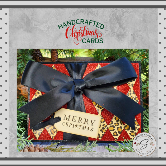 Custom Designed Elegantly Wild | 5" x 7" Leopard and Red Glitter Christmas Card | 1-1/2" Hand Tied Black Satin Bow | Merry Christmas Tag | Unique Keepsake