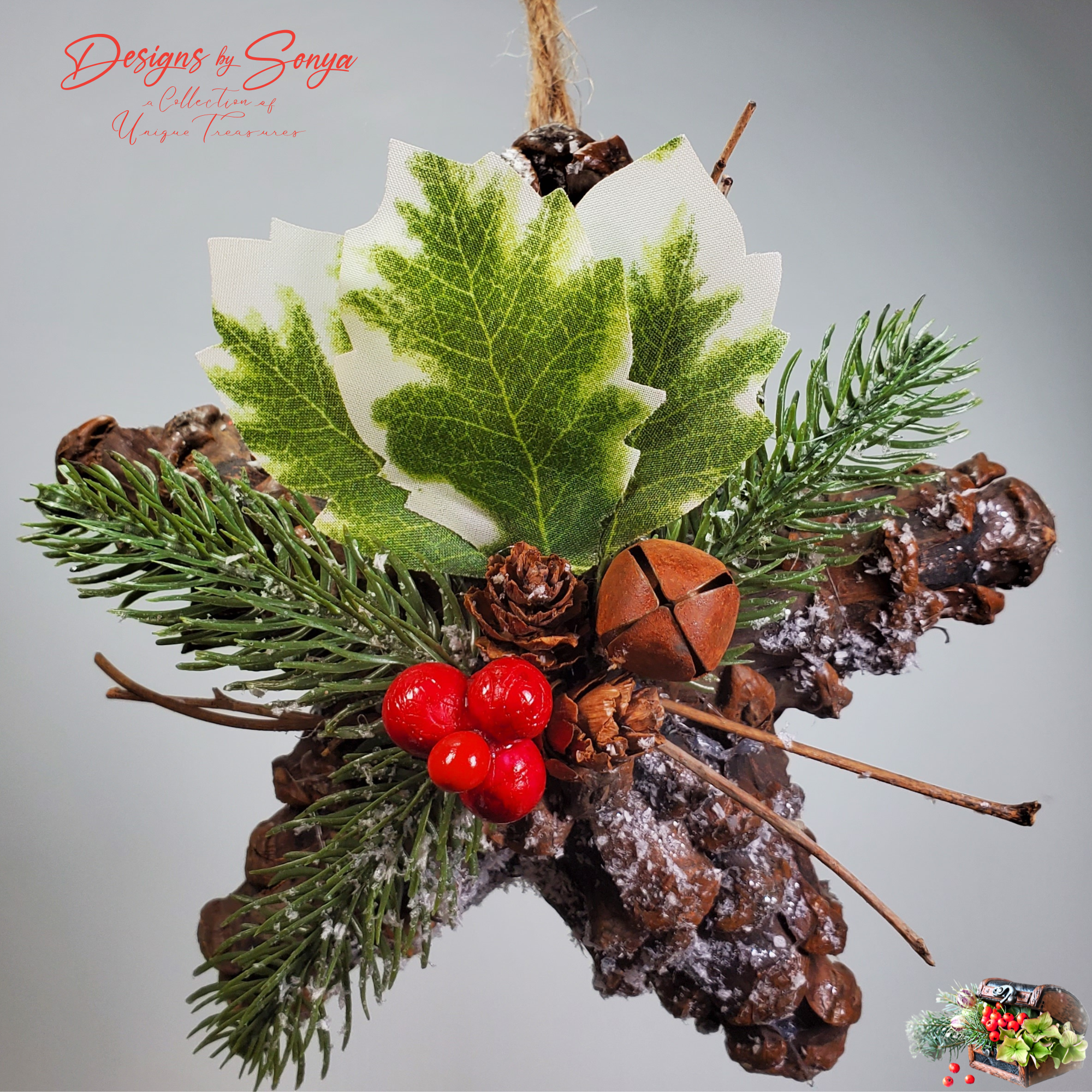 Rustic Pinecone Star Ornament Close View
Detailed closeup of farmhouse-style pinecone star ornament with faux holly leaves, pine sprigs, glossy red berries, and rustic bell accent.