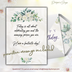 Prewritten Message Insert
Insert shows included message: “Today is all about celebrating you and the amazing person you are. Have a fantastic day!” Elegant florals frame the printed sentiment.