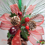 Top Close-Up with Green Sprigs
Handmade pinecone ornament showcasing red berries, holly leaves, glittered ribbon, and frosted pinecone tips with lifelike evergreen sprigs for rustic holiday style.