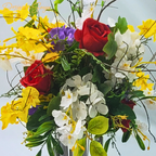 Side View of Floral Arrangement
Side angle of floral wind chime showing layered roses, orchids, and greenery for a full, vibrant design.