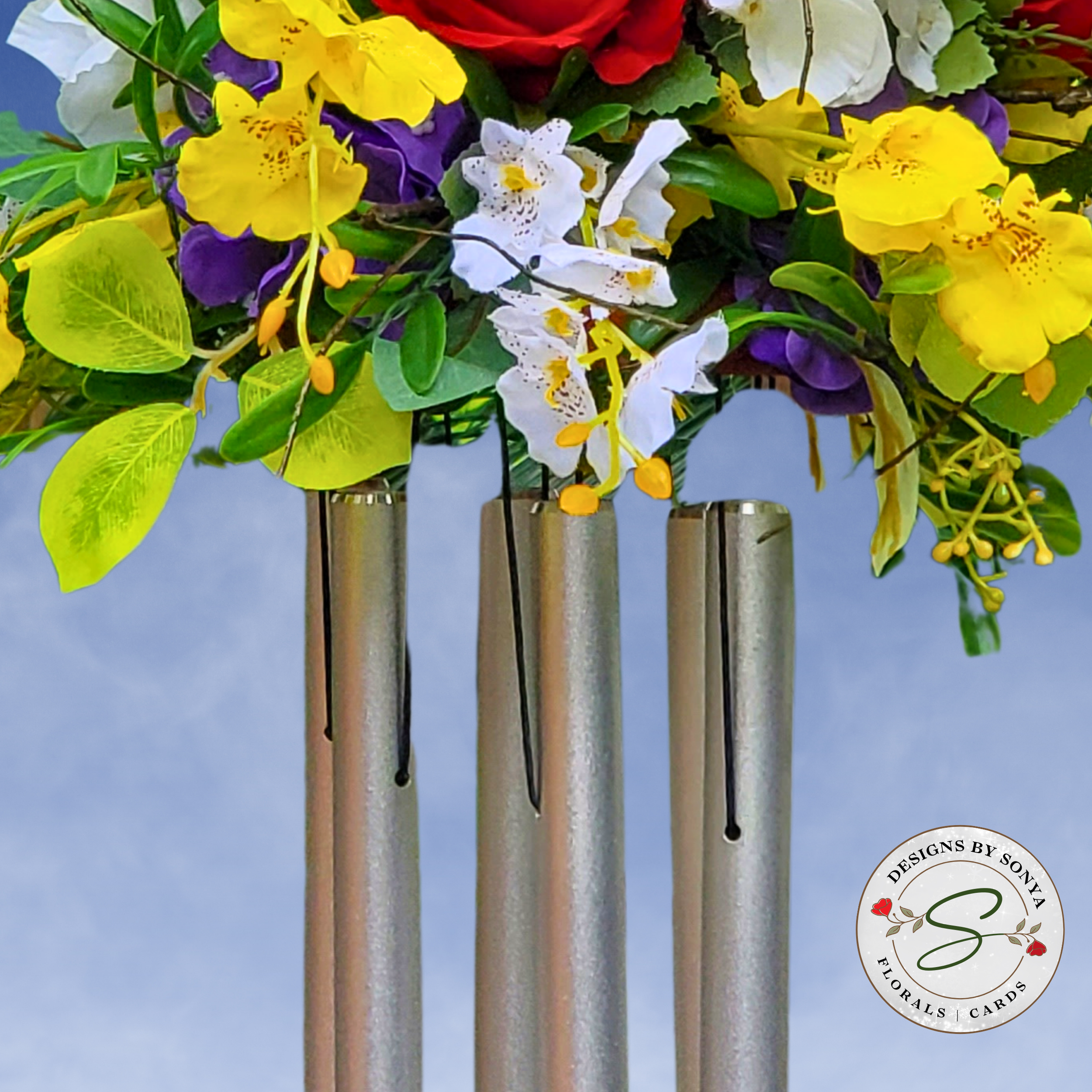 Wind Chime Tube Detail
Close-up of silver wind chime tubes paired with floral arrangement, showcasing craftsmanship and premium materials.
