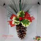 Studio Shot of Ornament
Clean background photo of handcrafted pinecone ornament with holly leaves, pine sprigs, and red bow for product detail clarity.