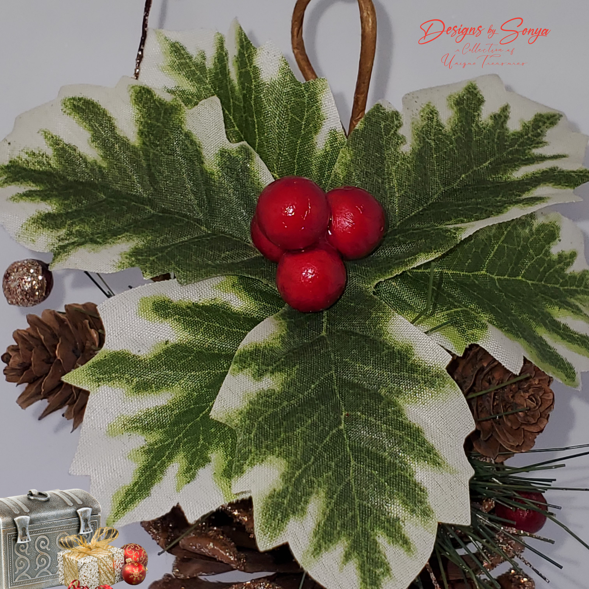 Close-Up of Holly Leaves and Red Berries
Detailed view of green holly leaves and glossy red berries topping a handmade pinecone ornament.