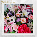 Mixed Floral Top View
Arrangement top view featuring stargazer lilies, roses, peonies, and lavender blooms, showcasing the lush, layered design.