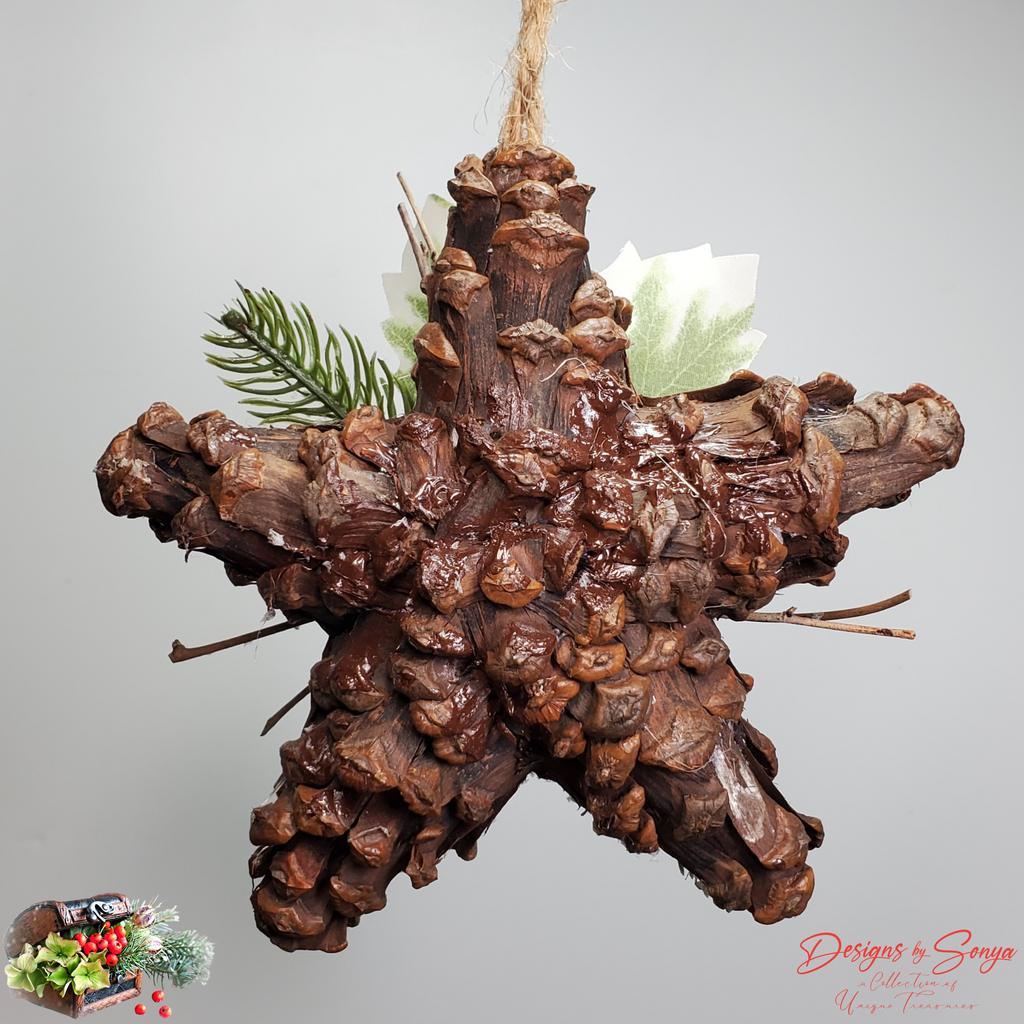 Back View of Pinecone Star Ornament
Handmade pinecone star ornament backside showing natural pinecone structure, rustic jute hanger, and farmhouse holiday style.