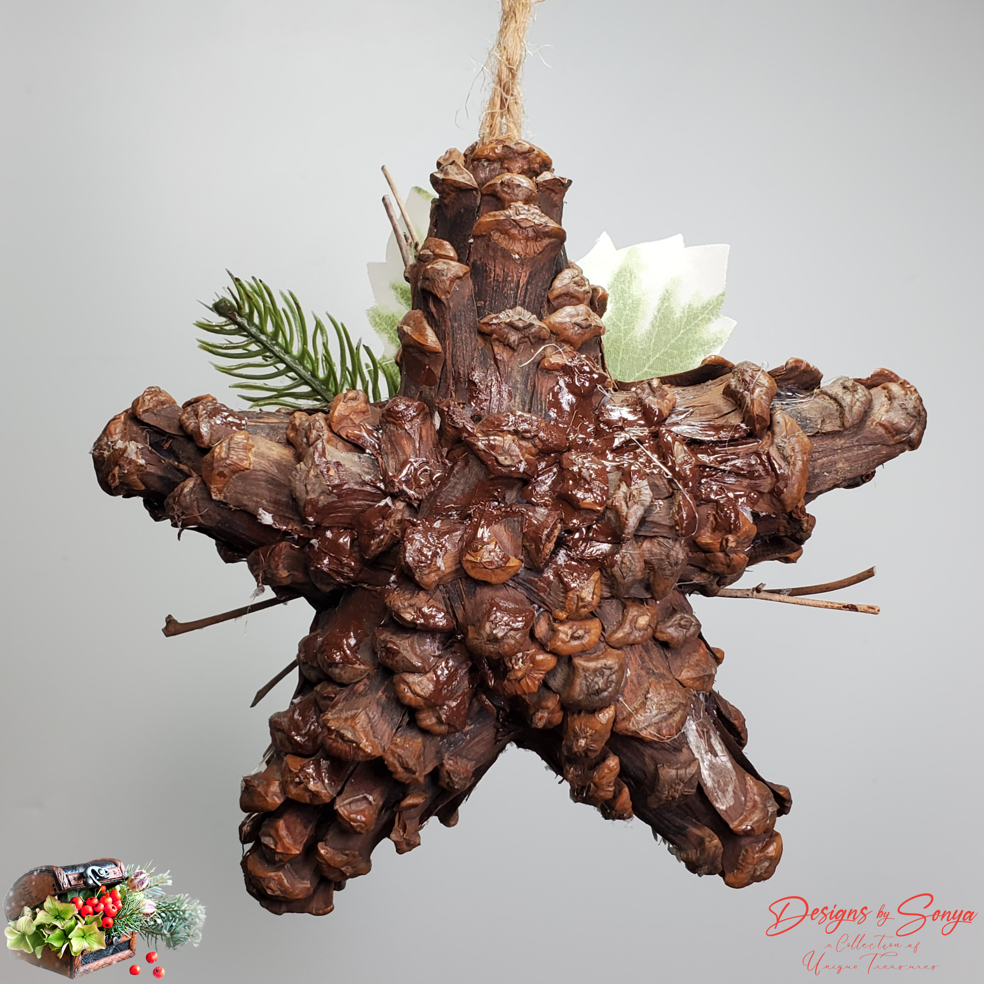 Back View of Pinecone Star Ornament
Handmade pinecone star ornament backside showing natural pinecone structure, rustic jute hanger, and farmhouse holiday style.