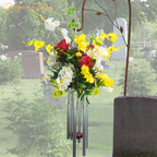 Cemetery Display
Floral wind chime arrangement displayed at a cemetery, creating a heartfelt and lasting memorial tribute.