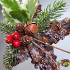 Closeup of Bell, Pine Sprigs, and Frosted Accents
Holiday pinecone ornament detail with rustic bell, red berries, pine greenery, and snowy farmhouse accents.